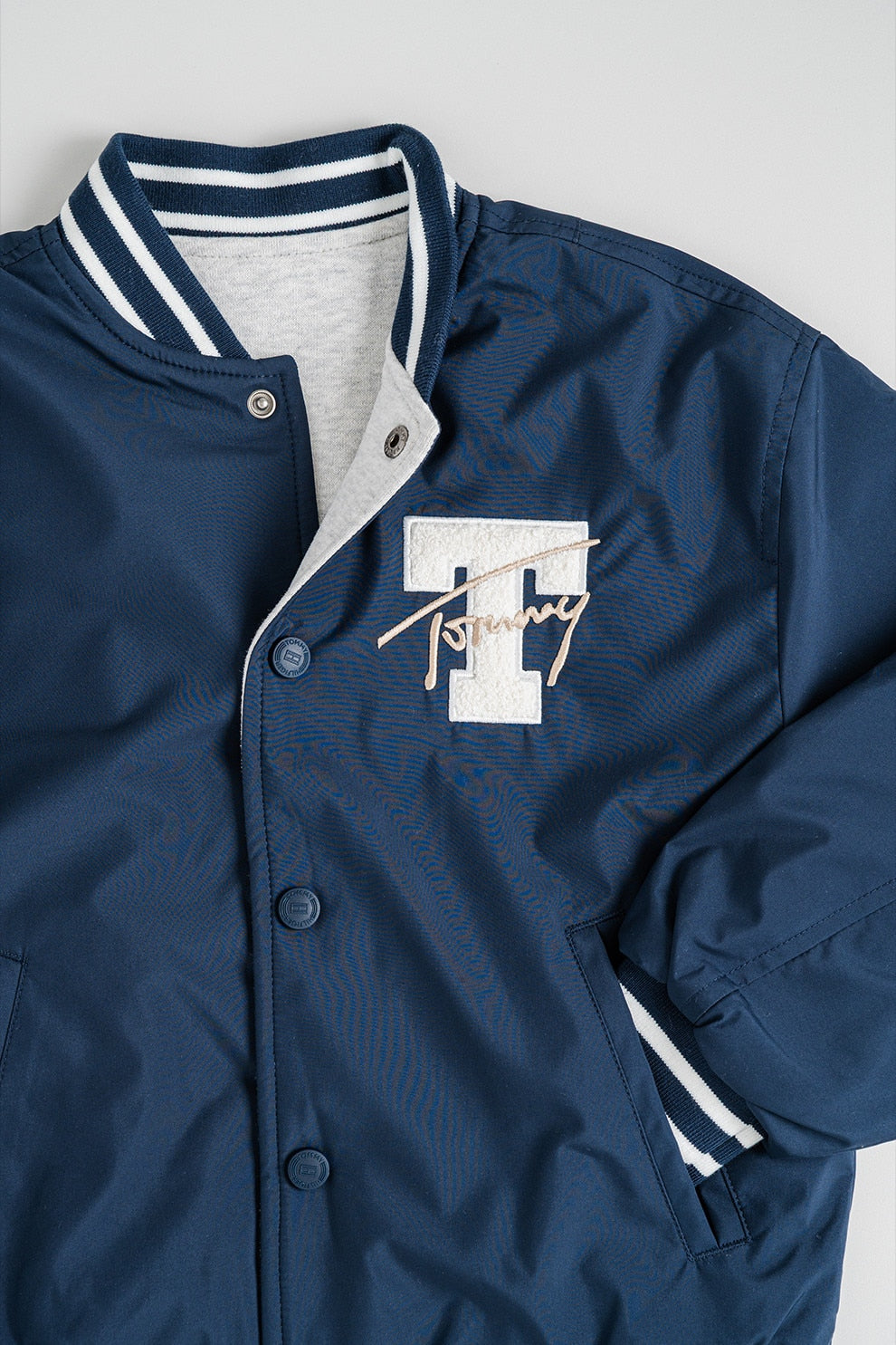 REVERSIBLE BOMBER JACKET 