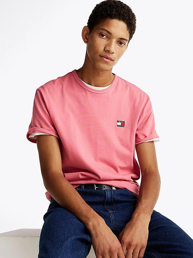 TJM REG BADGE TEE EX 
