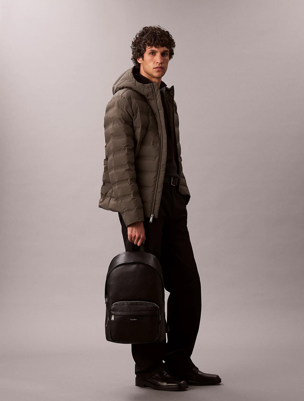 RAISED ROUND BACKPACK 