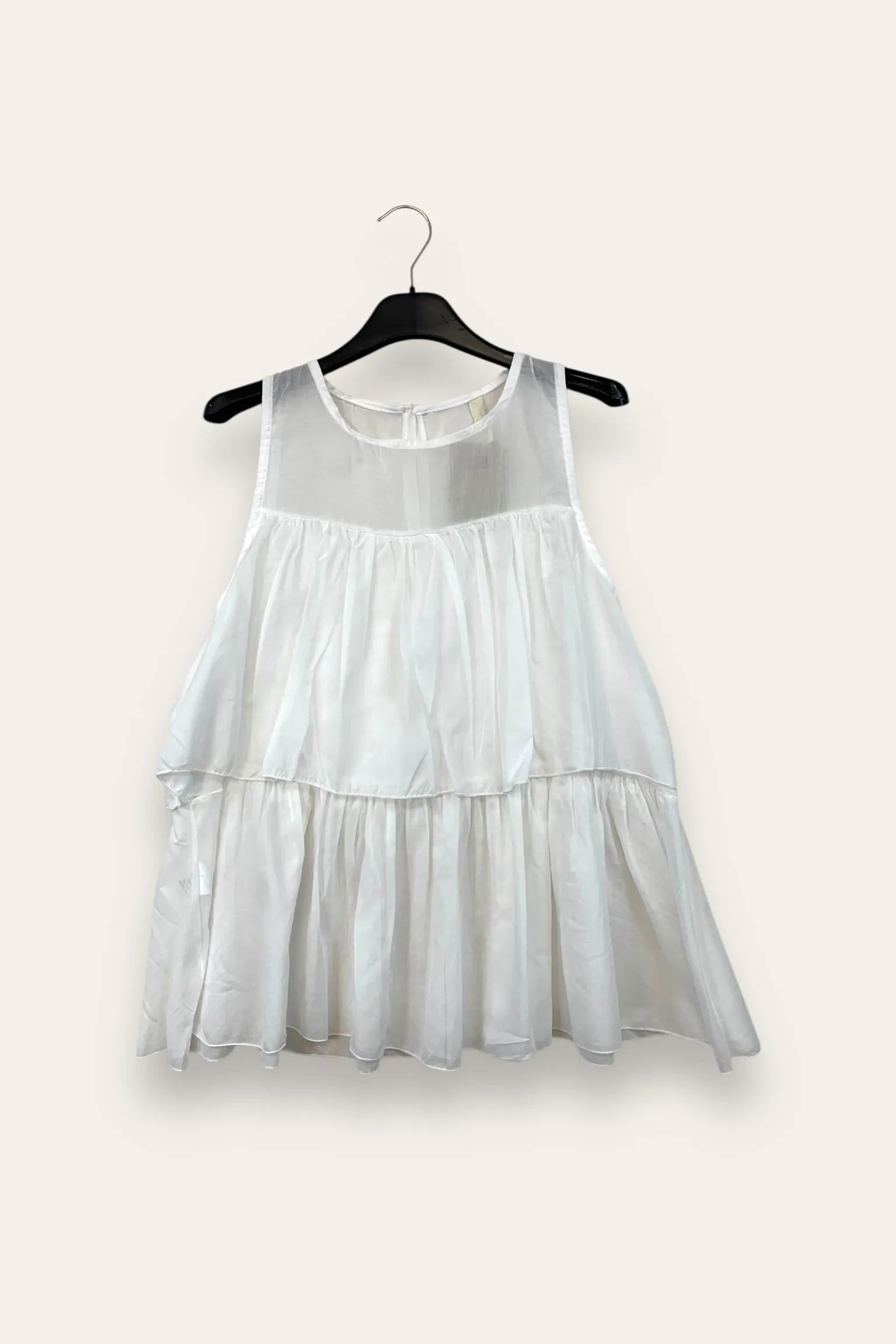 Canotta a balze con bottone dietro 