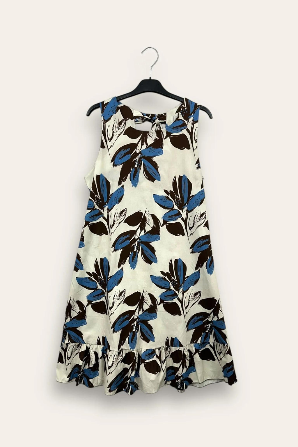 Abito in fantasia con fiocco dietro il collo 