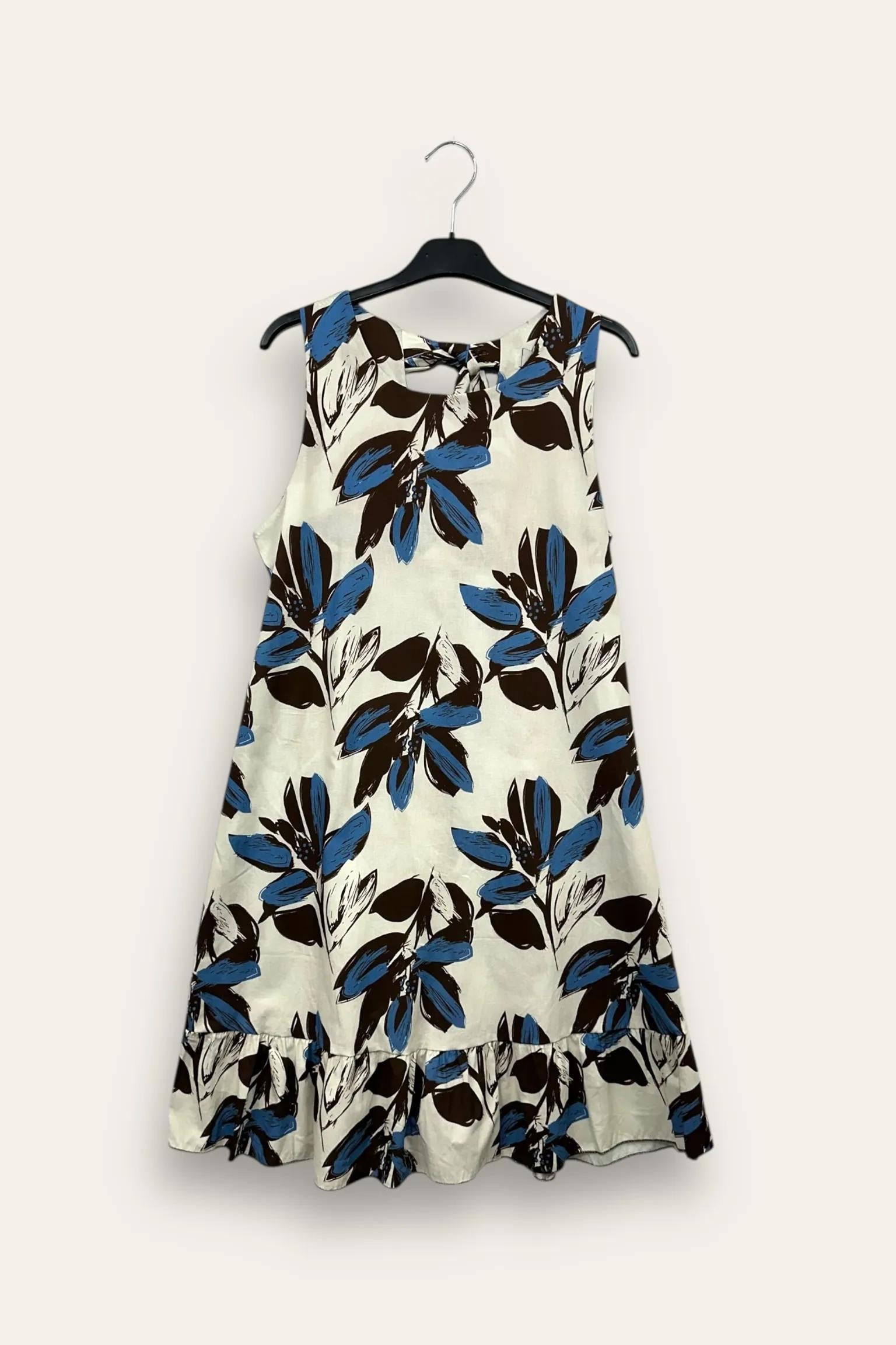 Abito in fantasia con fiocco dietro il collo 