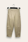 Carrot-shaped faux leather trousers