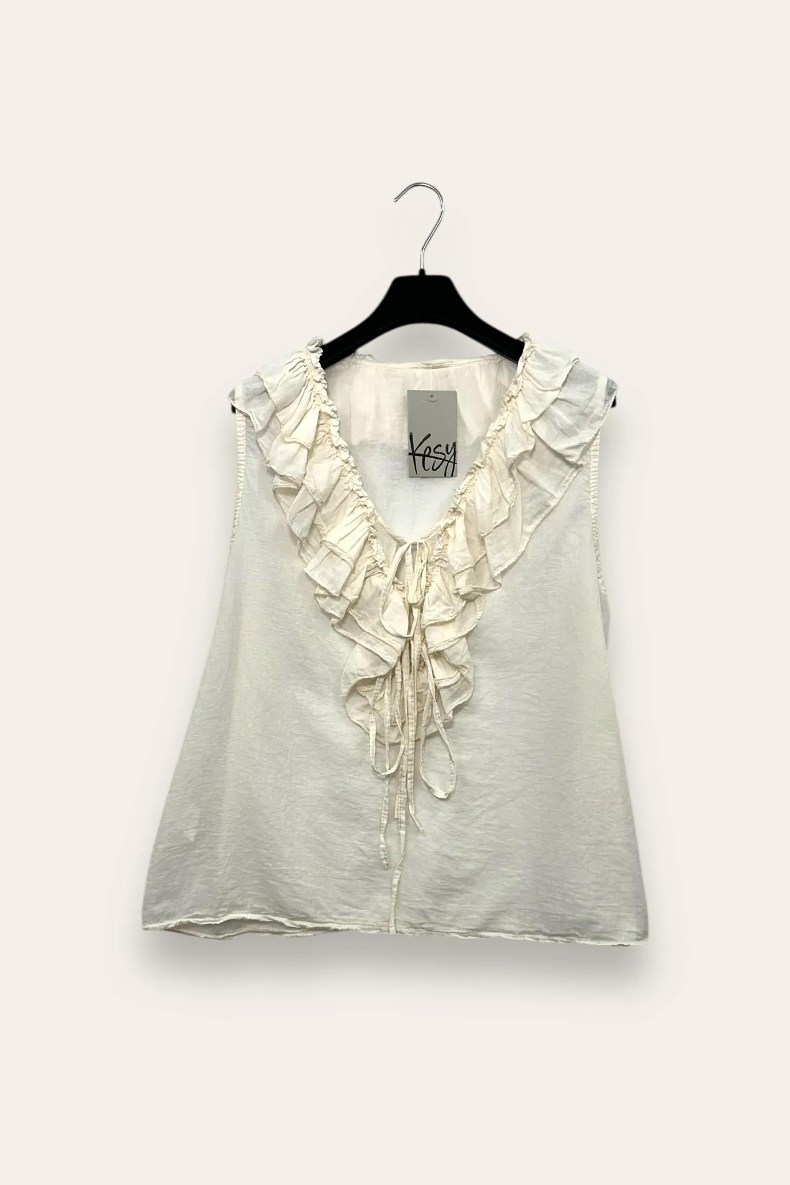 Blusa in mussola di cotone con volant davanti 