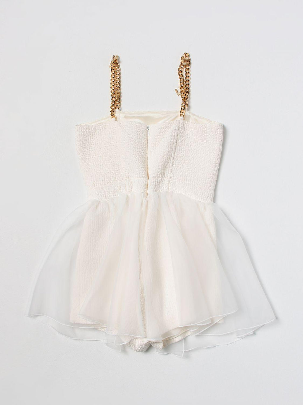 TUTA CON BRETELLE CON CHARMS 