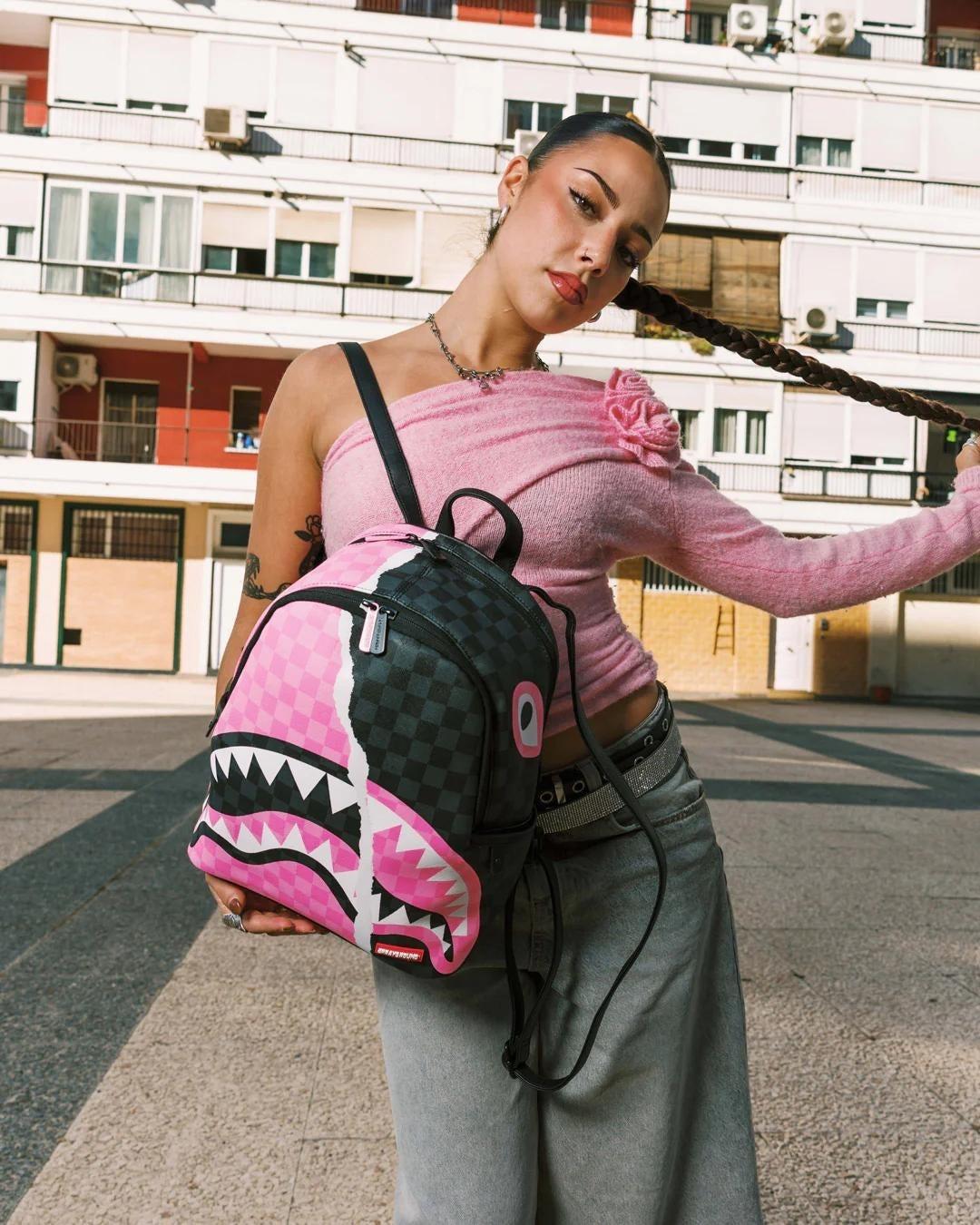 PINK AND BLACK TEAR SIP SAVAGE BACKPACK 