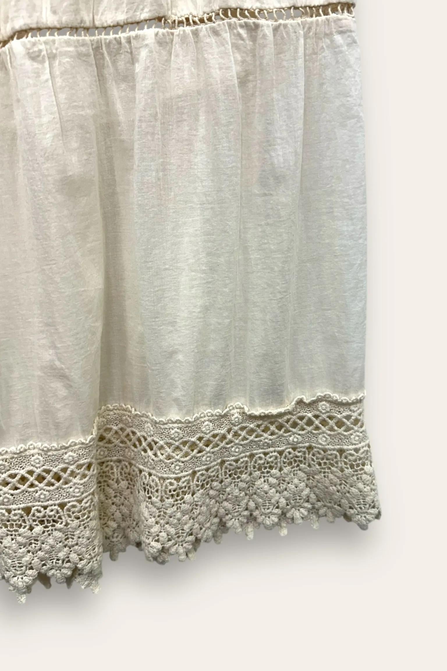 Gonna a balze in mussola di cotone con pizzo al fondo 