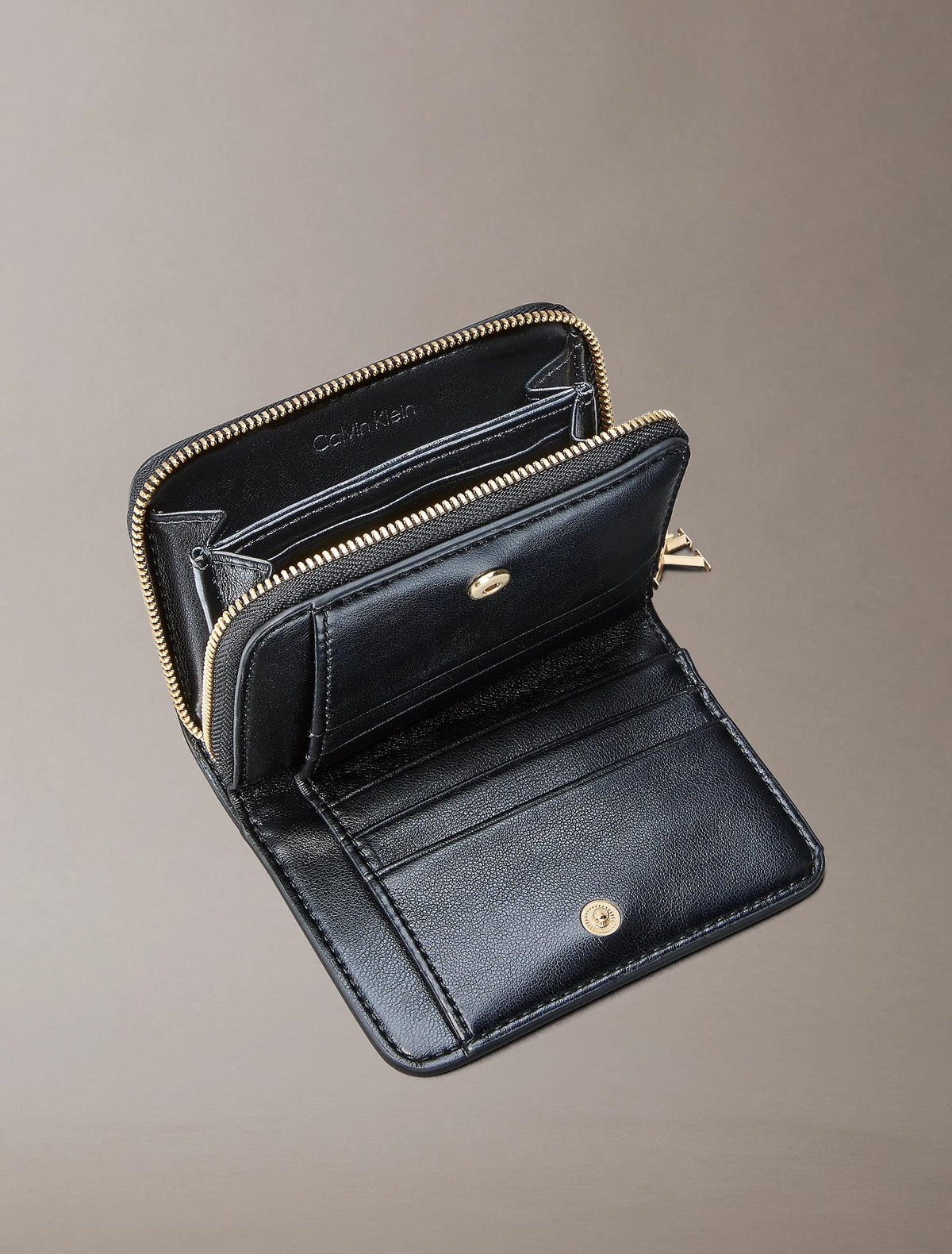CK MEDIUM FLAP ZIP AROUND 