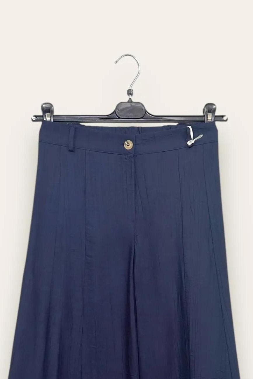 Pantalone a palazzo in viscosa goffrata 